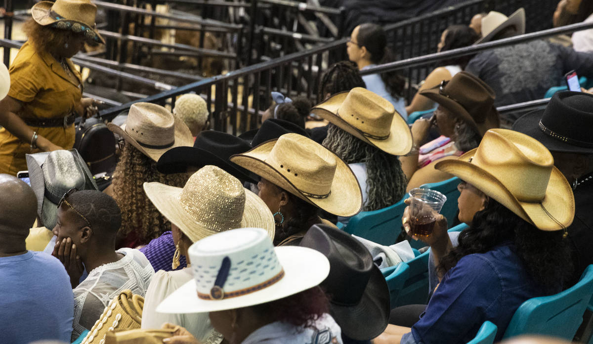 People watch the Bill Pickett Invitational Rodeo, the nation's only touring black rodeo competi ...