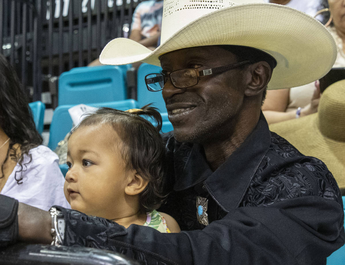 Darrel Turman, of Lons Angeles, watches the Bill Pickett Invitational Rodeo, the nation's only ...