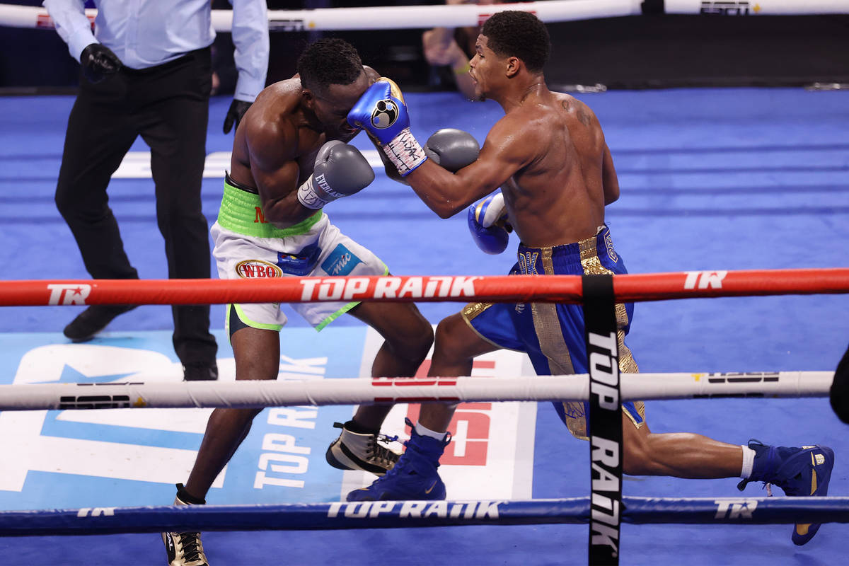 Shakur Stevenson, right, connects a punch against Jeremiah Nakathila in the 12th round of the W ...