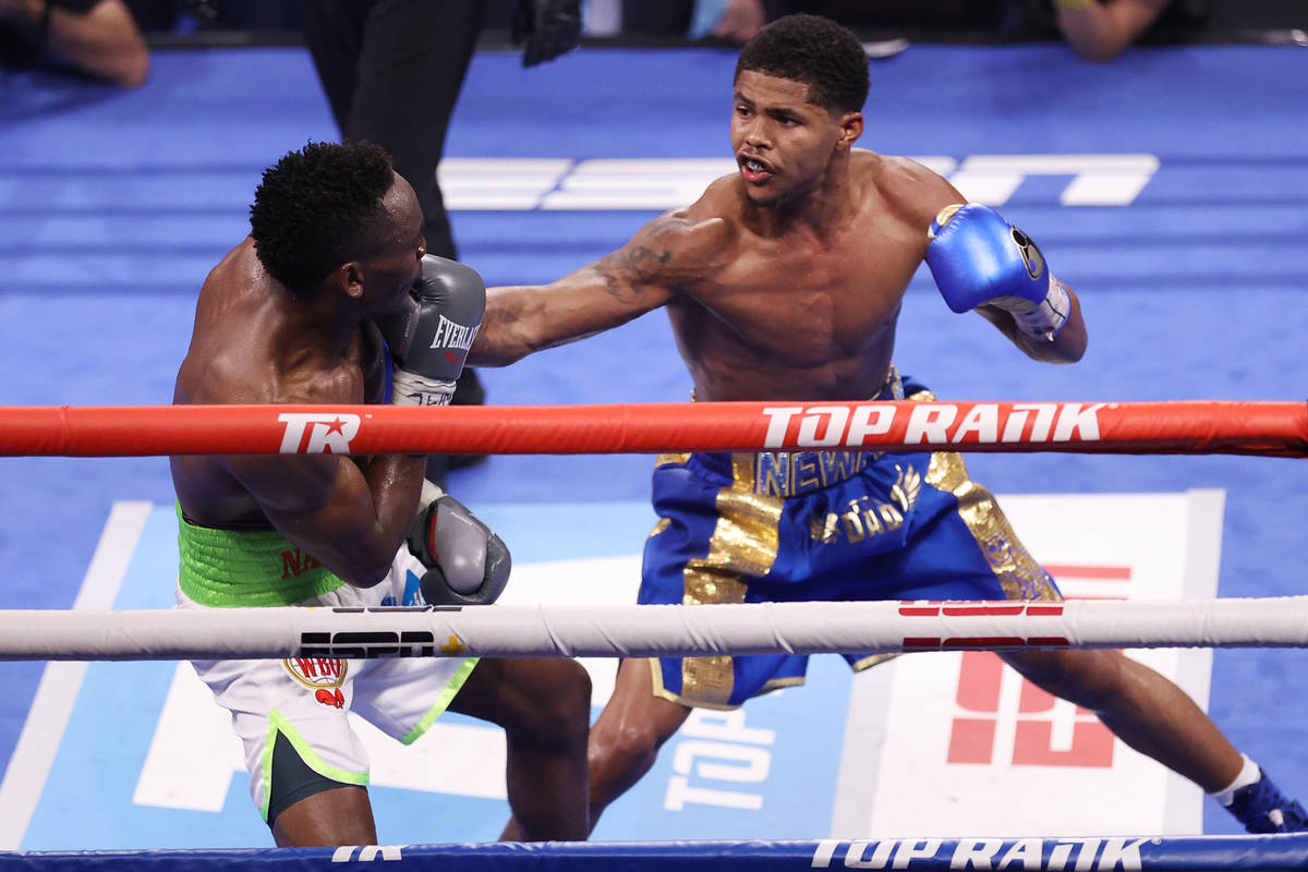 Shakur Stevenson, right, connects a punch against Jeremiah Nakathila in the 11th round of the W ...
