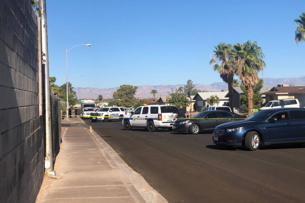Police are on the scene of an officer-involved shooting Saturday, Aug. 1, 2020, in a residentia ...