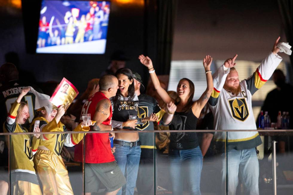 Golden Knights fans celebrate before the third period of Game 1 of an NHL Stanley Cup semifinal ...