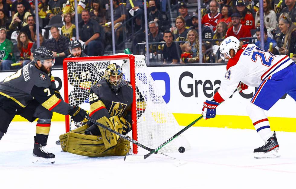 A scoring attempt by Montreal Canadiens' Eric Staal (21) gets stopped by Golden Knights' Alex P ...