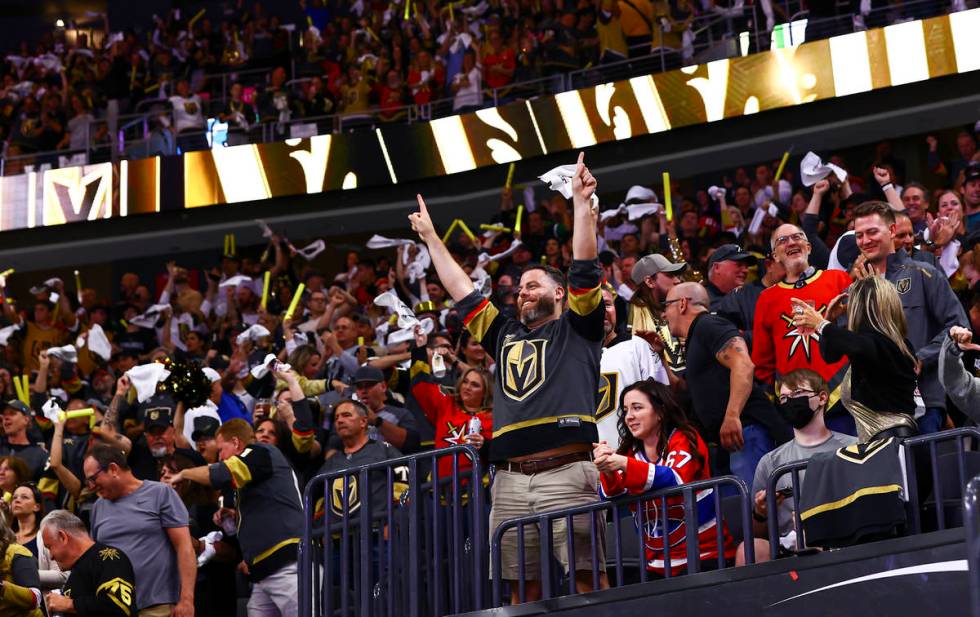 Golden Knights fans celebrate a goal by defenseman Alec Martinez, not pictured, during the seco ...