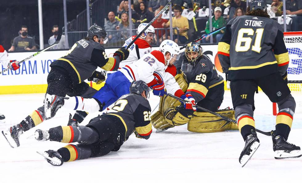 Golden Knights goaltender Marc-Andre Fleury (29) stops the puck in front of Montreal Canadiens' ...