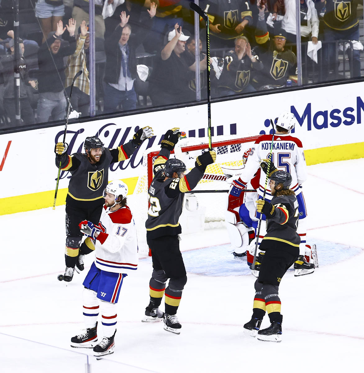 Golden KnightsÕ Nick Holden (22) celebrates his goal with teammates during the third perio ...