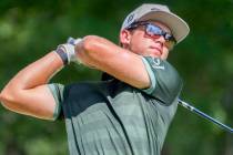 Garrick Higgo, of South Africa, watches his drive down the 12th fairway during the third round ...