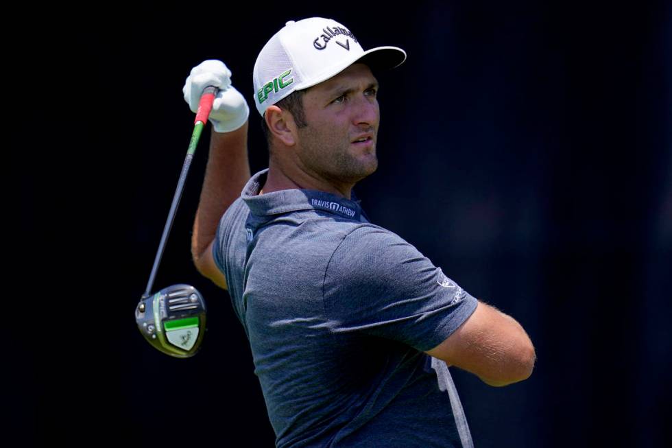 Jon Rahm, of Spain, hits from the seventh tee during a practice round of the U.S. Open Golf Cha ...