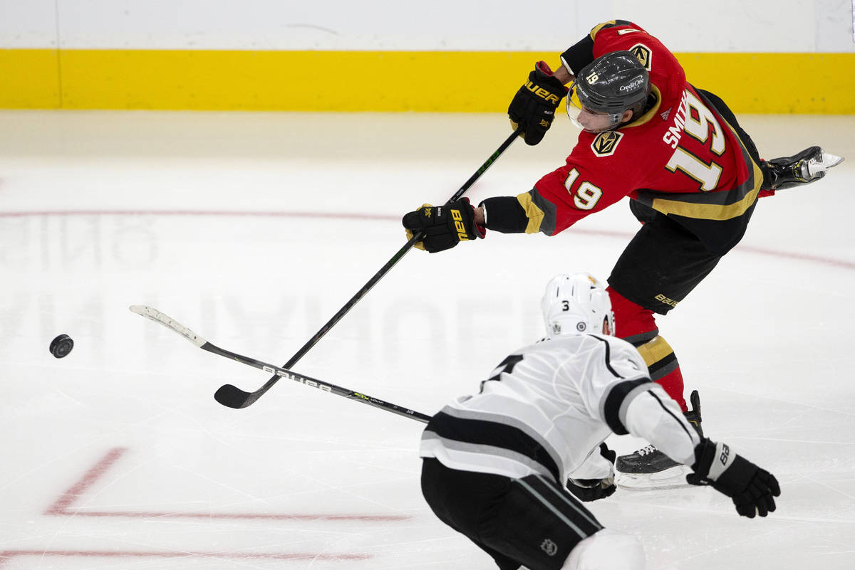 Golden Knights right wing Reilly Smith (19) takes a shot on goal as Kings defenseman Matt Roy ( ...