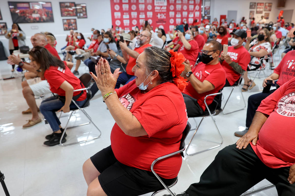 Culinary Workers Union Local 226 members, including Maria Hernandez-Sanchez, cheer at their uni ...