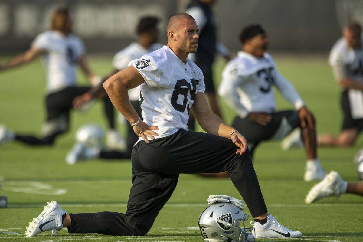 Raiders tight end Derek Carrier (85) stretches during an NFL football practice on Wednesday, Ju ...