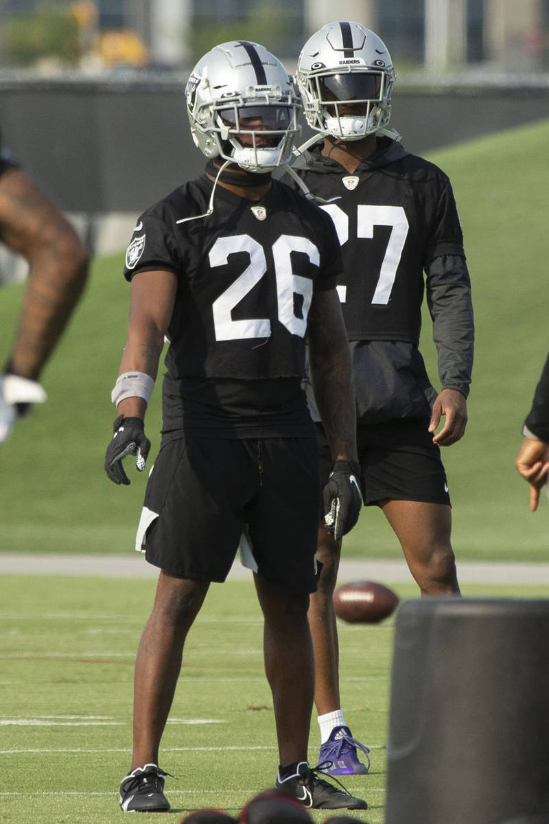 Raiders cornerbacks Nevin Lawson (26) and Trayvon Mullen (27) during their NFL football practic ...