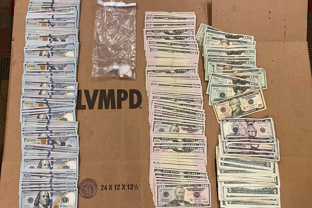 Las Vegas police seized more than $18,000 in cash and crack cocaine during an early-morning arr ...