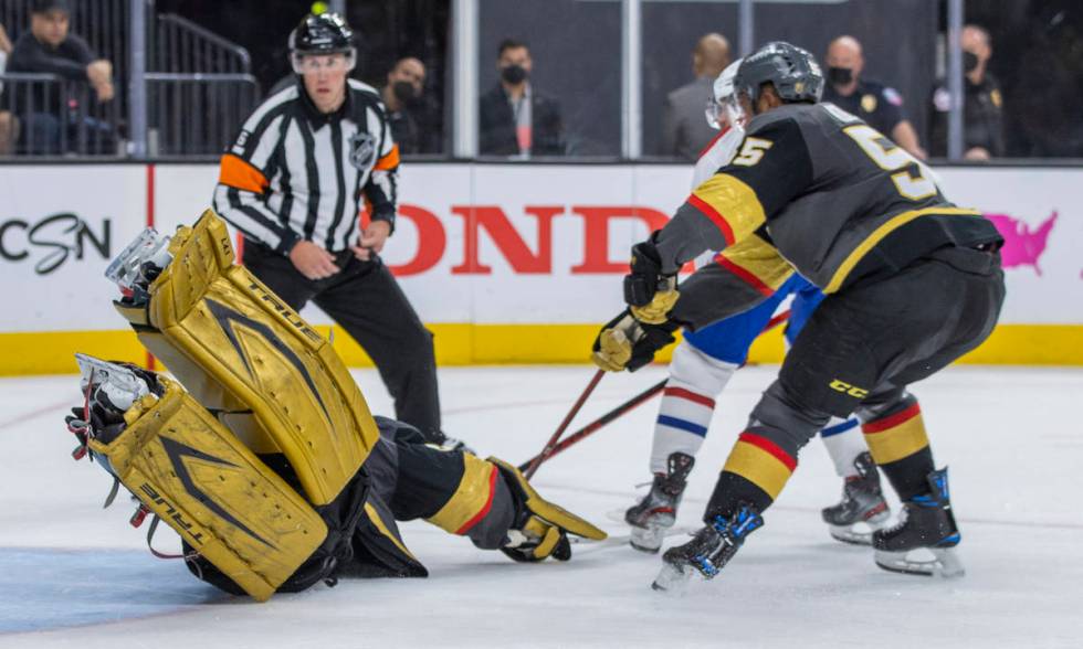 Golden Knights goaltender Marc-Andre Fleury (29) dives to try and stop a shot on goal versus th ...