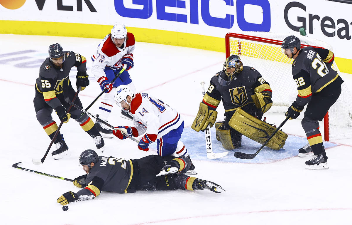 Golden Knights' Brayden McNabb (3) looks to block the puck in front of Montreal Canadiens' Nick ...