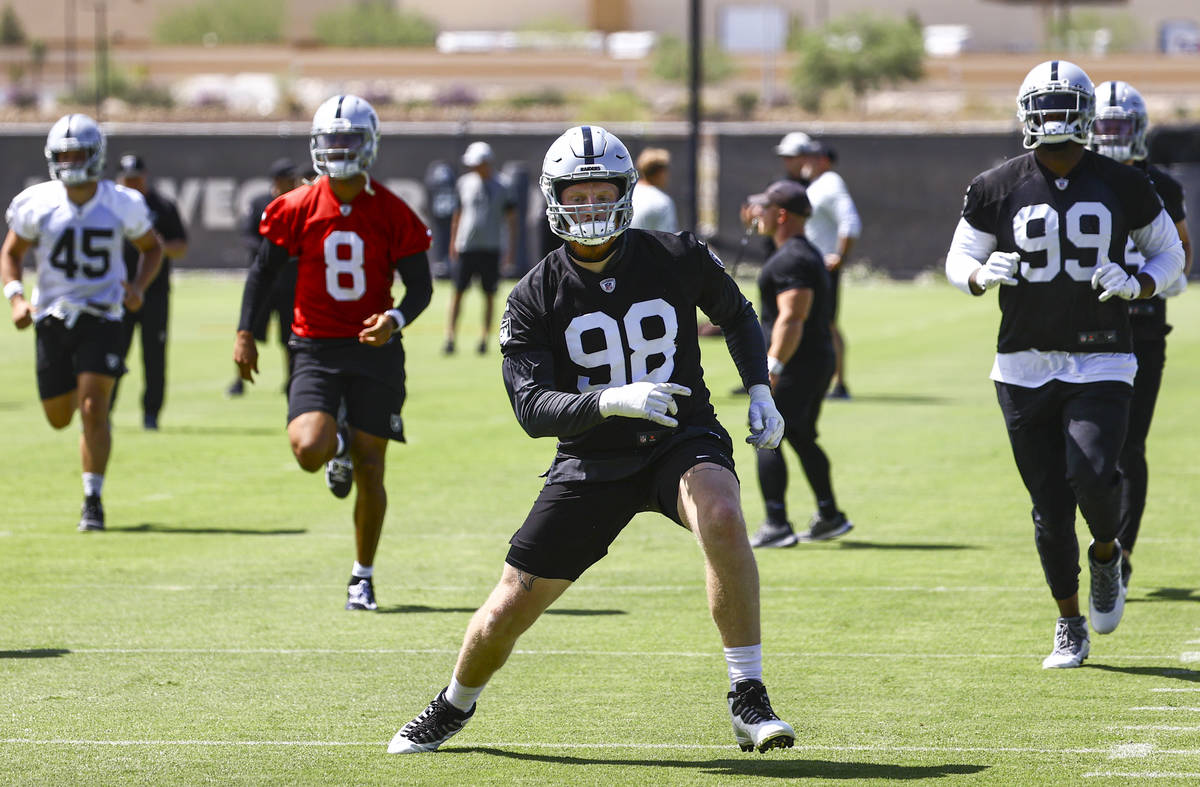 Raiders defensive end Maxx Crosby (98) warms up during NFL football practice at Raiders headqua ...