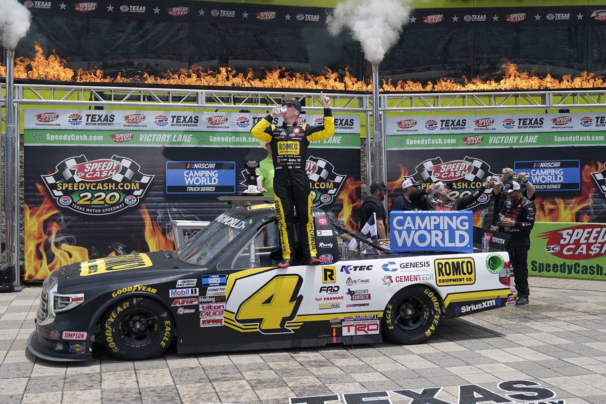 John Hunter Nemechek celebrates in Victory Lane after winning a NASCAR Truck Series auto race a ...