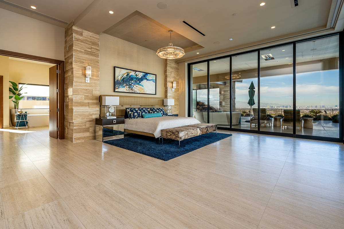 The master suite has access to the oversized pool and cold plunge. (Sun West Luxury Realty)