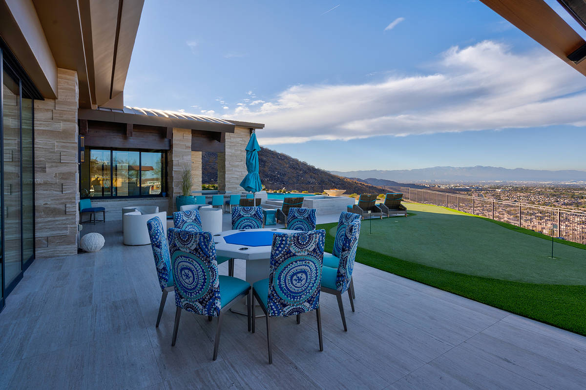 The home has a putting green. (Sun West Luxury Realty)