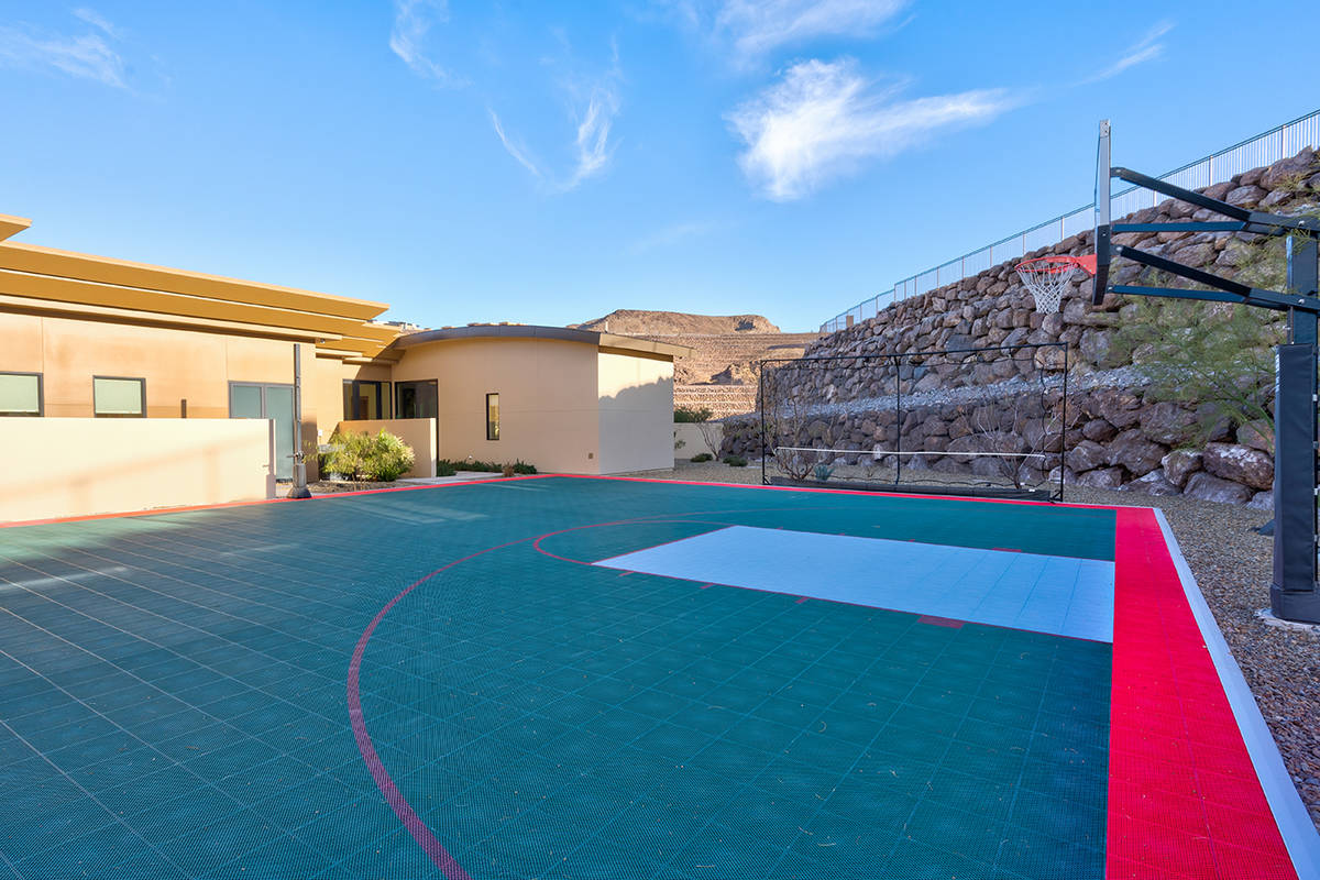 The Ascaya home that belonged to 80-year-plus bachelor Stan Gribble features a sports court. (S ...