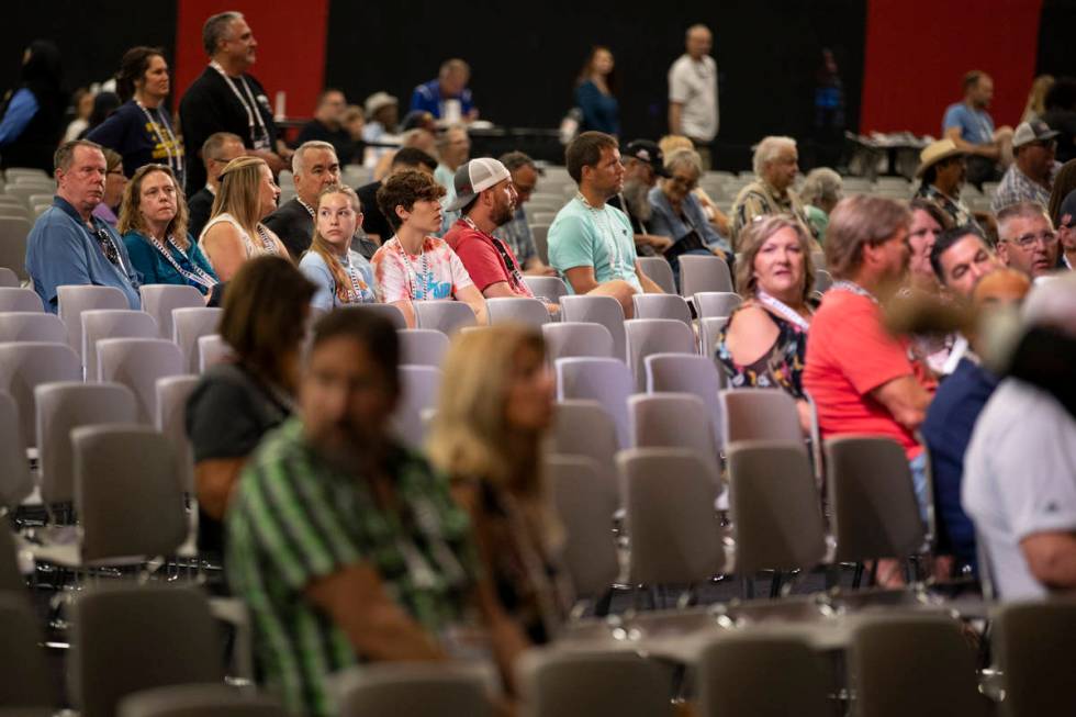 People attend the Barrett-Jackson auction at the Las Vegas Convention Center West Hall in Las V ...