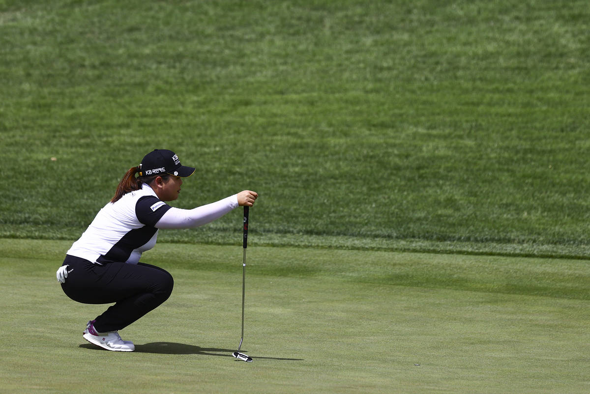 Inbee Park lines up a putt shot at the 12th hole during the first round of the Bank of Hope LPG ...