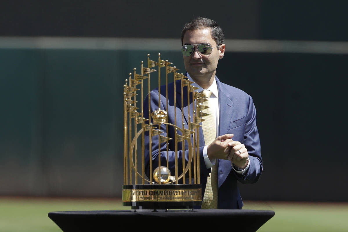 Oakland Athletics President Dave Kaval stands behind the team's 1989 World Series championship ...