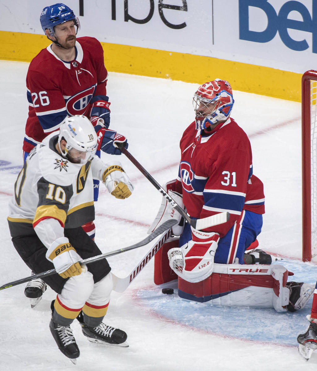 Vegas Golden Knights' Nicolas Roy (10) reacts after scoring against Montreal Canadiens goaltend ...