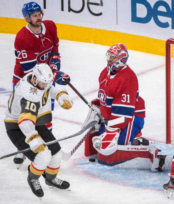 Vegas Golden Knights' Nicolas Roy (10) reacts after scoring against Montreal Canadiens goaltend ...