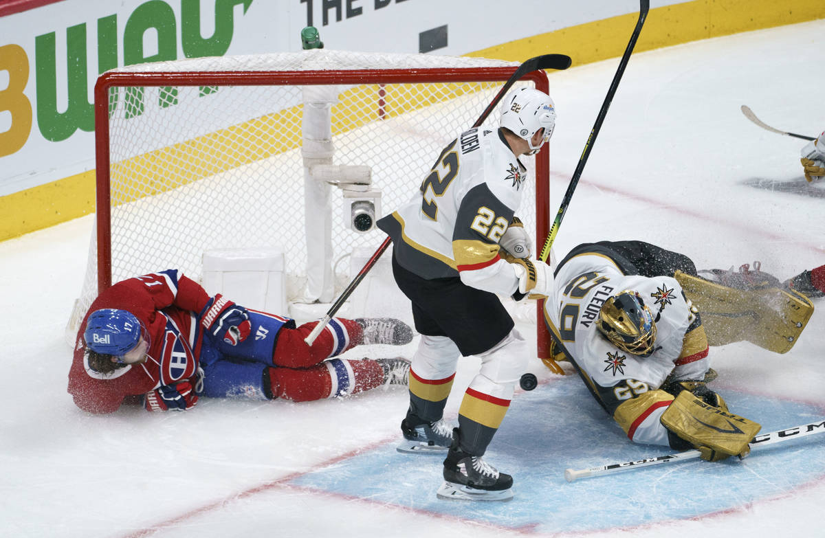 Montreal Canadiens' Josh Anderson slides into the net of Vegas Golden Knights goaltender Marc-A ...