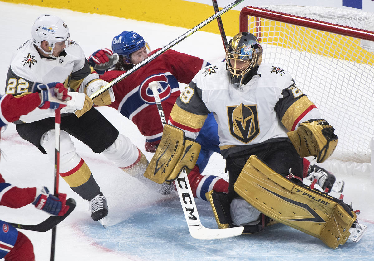 Montreal Canadiens' Josh Anderson (17) slides in on Vegas Golden Knights goaltender Marc-Andre ...