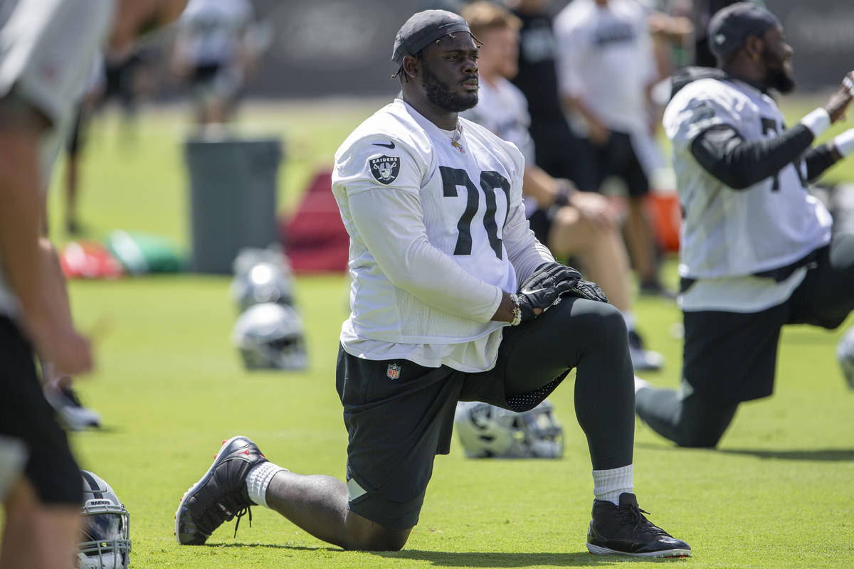 Raiders offensive tackle Alex Leatherwood (70) stretches during the teamÕs NFL football pr ...