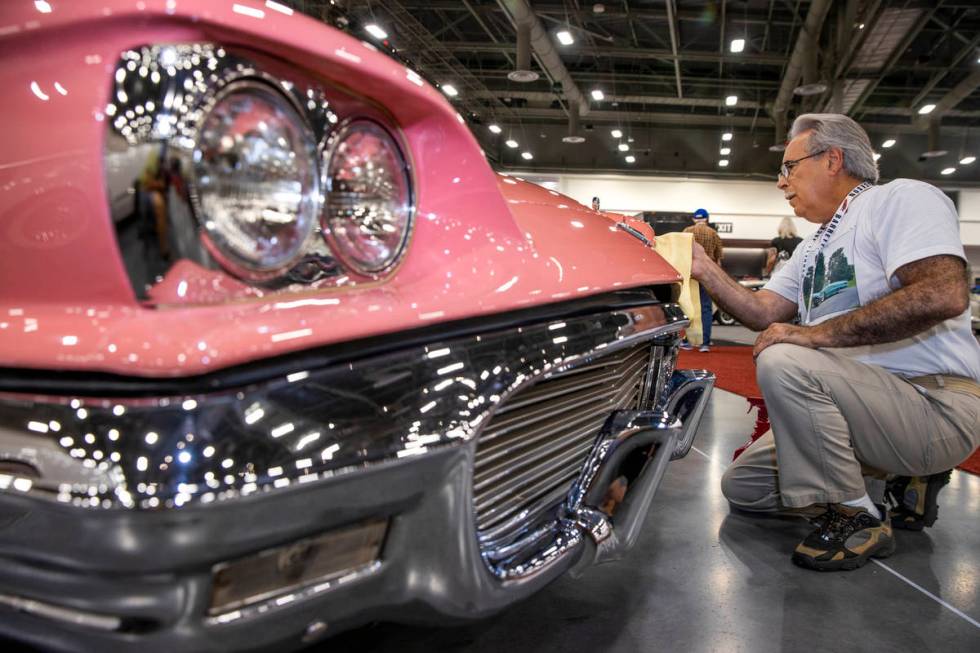 New owner Steve Maconi of Wilmington, Delaware, polishes up his 1959 Ford Thunderbird Convertib ...
