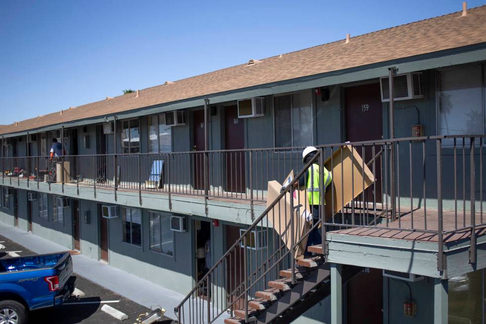 Carpenters from the Local 1977 union volunteer to remodel units for homeless veterans at Vetera ...