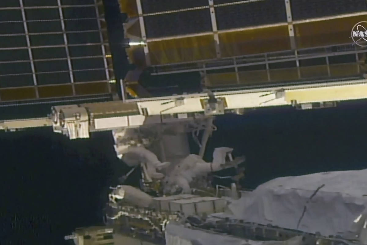 In this image taken from NASA video, NASA astronaut Shane Kimbrough, left, and French astronaut ...