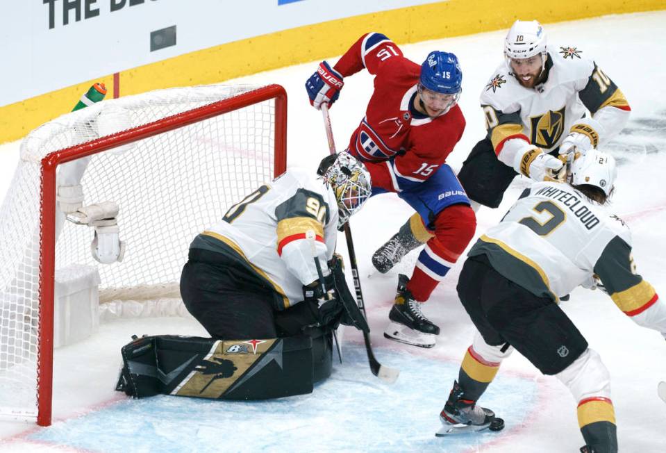 Vegas Golden Knights goaltender Robin Lehner makes a save off Montreal Canadiens' Jesperi Kotka ...