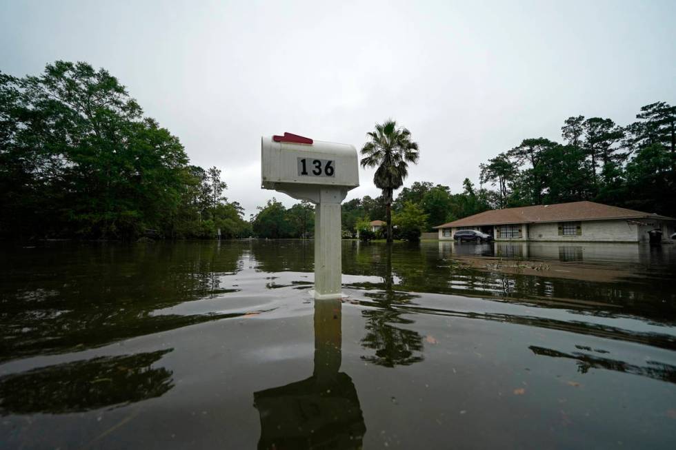 A flooded neighborhood is seen after Tropical Storm Claudette passed through in Slidell, La., S ...