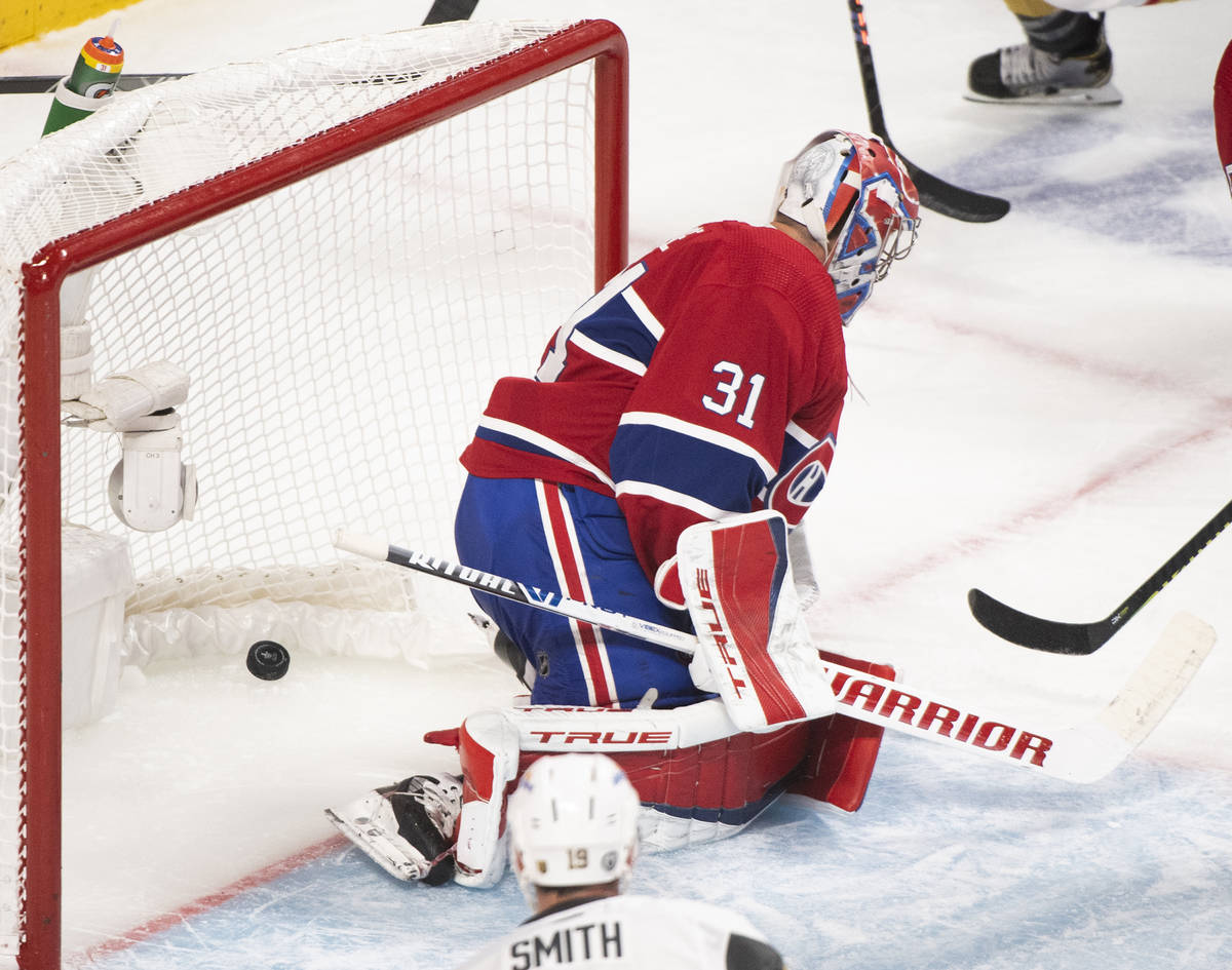 Montreal Canadiens goaltender Carey Price is scored on by Vegas Golden Knights' Brayden McNabb ...