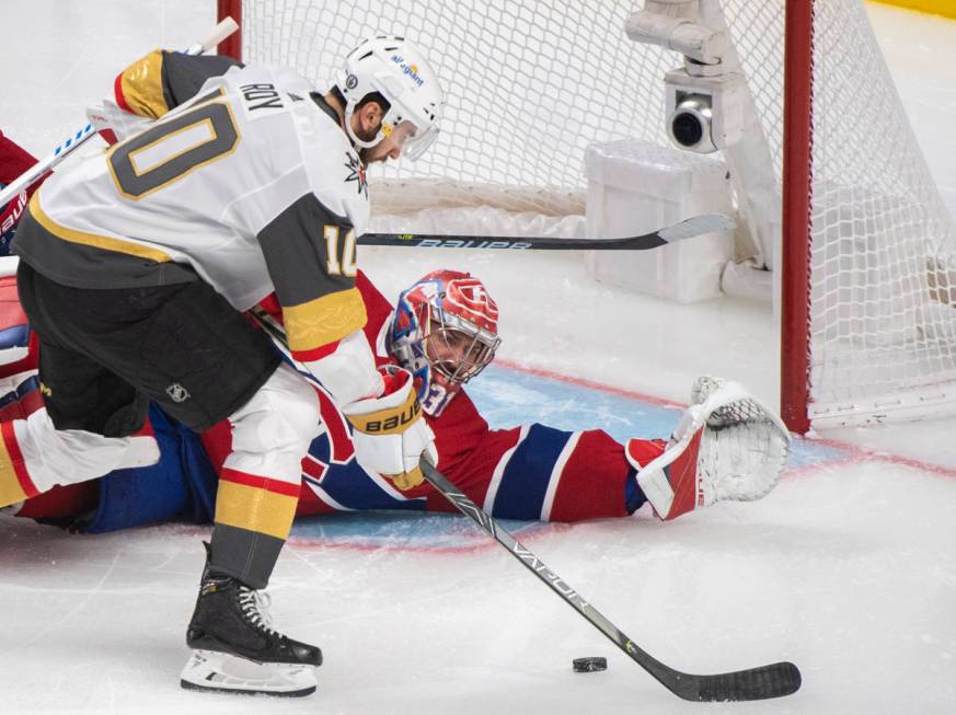 Vegas Golden Knights' Nicolas Roy scores against Montreal Canadiens goaltender Carey Price duri ...