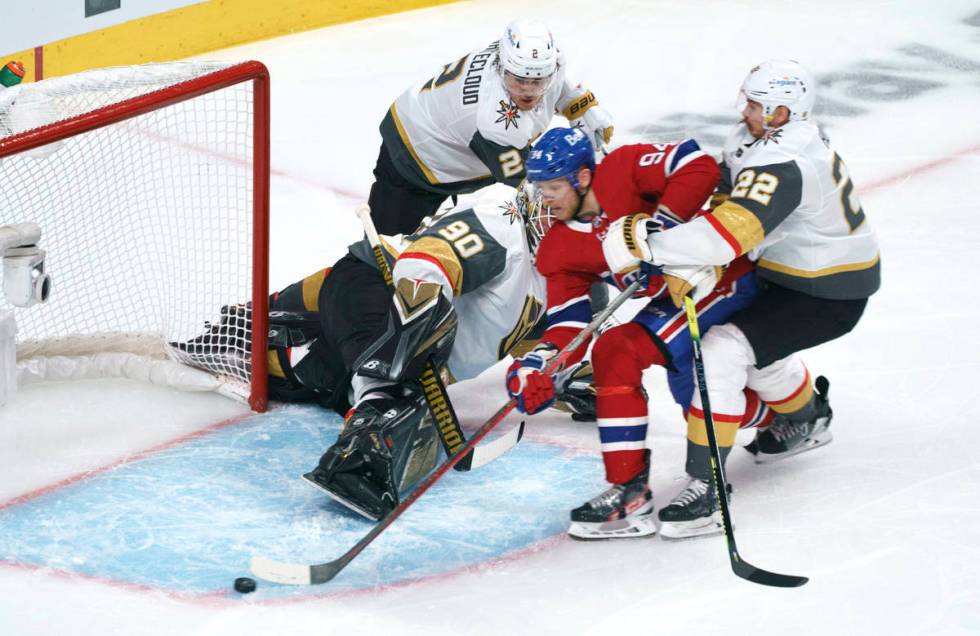 Montreal Canadiens' Corey Perry can't get the puck past a net left empty by Vegas Golden Knight ...