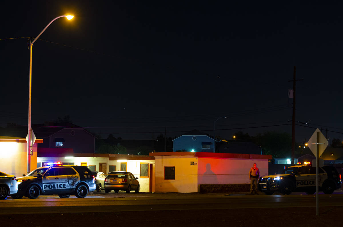 Las Vegas police investigate the scene of a homicide on Boulder Highway north of Russell Road i ...