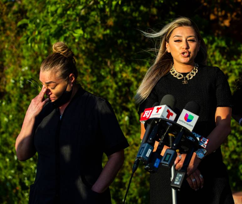 Aracely Palacio, left, wipes a tear as attorney Ofelia Markarian speaks during a news conferenc ...