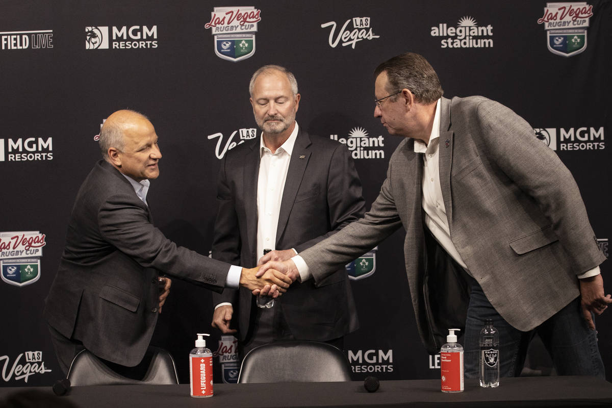 Marc Badain, from left, Las Vegas Raiders president, Steve Hill, CEO and president of Las Vegas ...