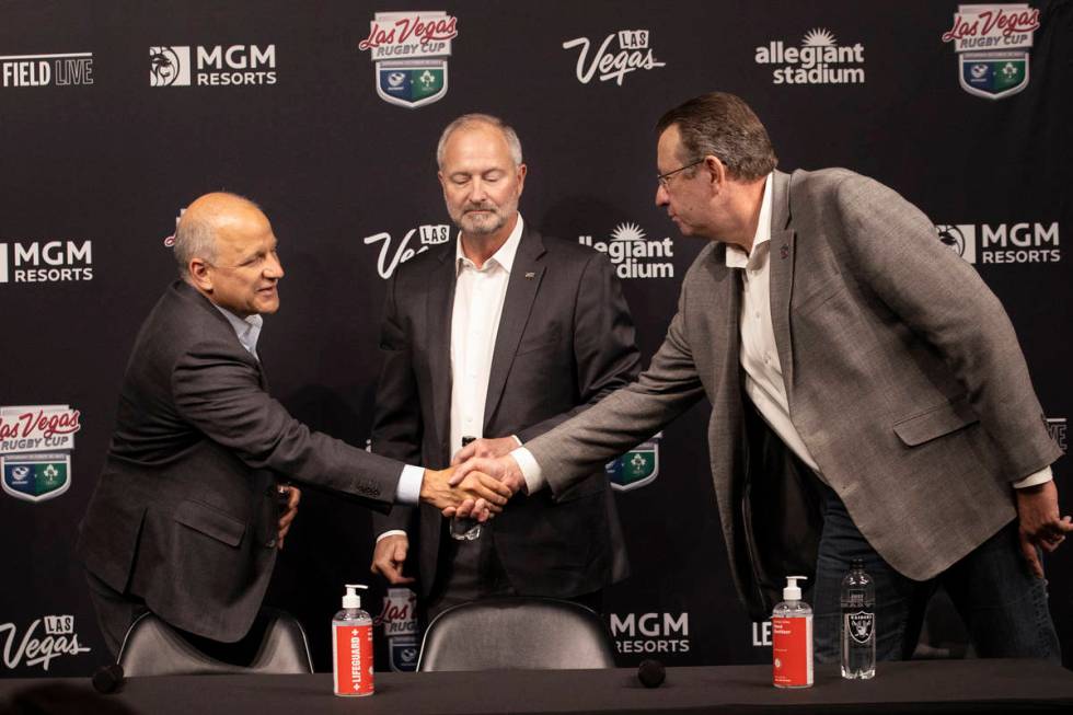 Marc Badain, from left, Las Vegas Raiders president, Steve Hill, CEO and president of Las Vegas ...
