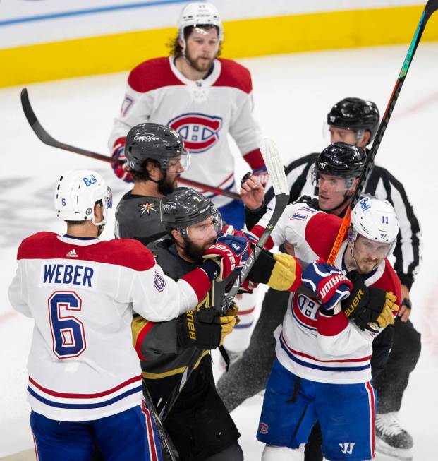 Golden Knights defenseman Alex Pietrangelo (7) and Canadiens right wing Brendan Gallagher (11) ...