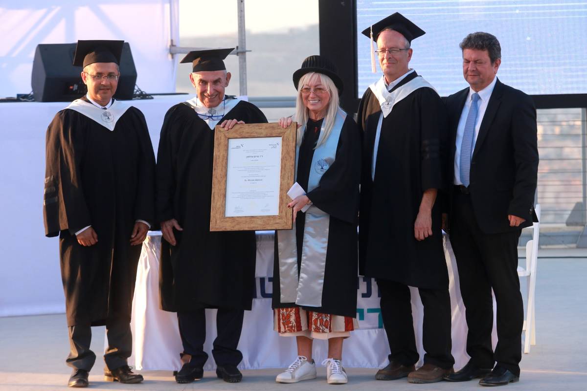 Dr. Miriam Adelson receives her honorary doctorate from Professor Yehuda Shoenfeld, president o ...