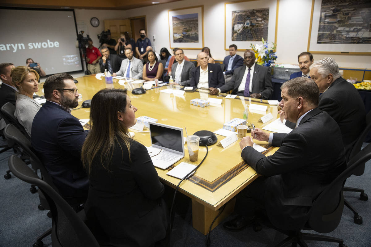 U.S. Labor Secretary Marty Walsh, right, speaks during a round table discussion on the American ...