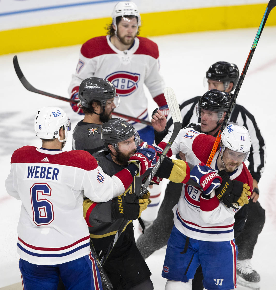 Golden Knights defenseman Alex Pietrangelo (7) and Canadiens right wing Brendan Gallagher (11) ...