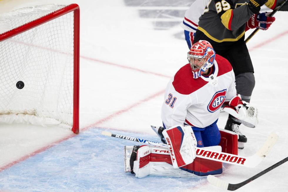 Canadiens goaltender Carey Price (31) watches Golden Knights left wing Max Pacioretty's (67) sh ...