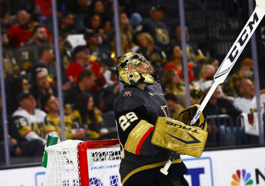 Golden Knights goaltender Marc-Andre Fleury (29) looks at the screen after giving up the first ...